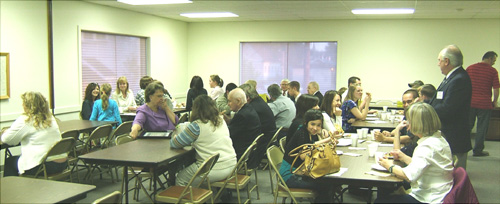 Let's have some pizza! Friends, family and Lodge members celebrate with pizza and pop afterwards.